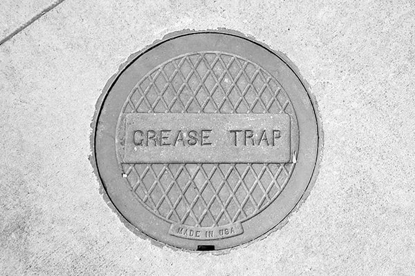 grease trap pumping prevents clogs, odors, and potential health code violations